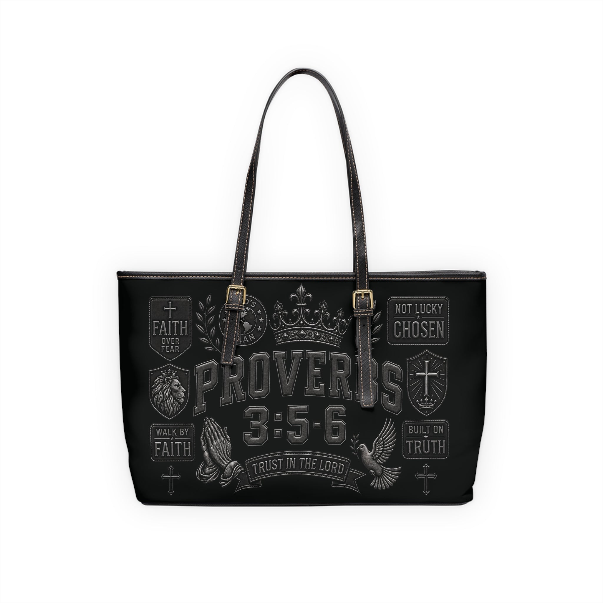 A black tote bag with dark brown leather handles and a detailed gothic-style graphic print featuring the text 'PROVERBS 3:5-6' and religious symbols in gray and white.